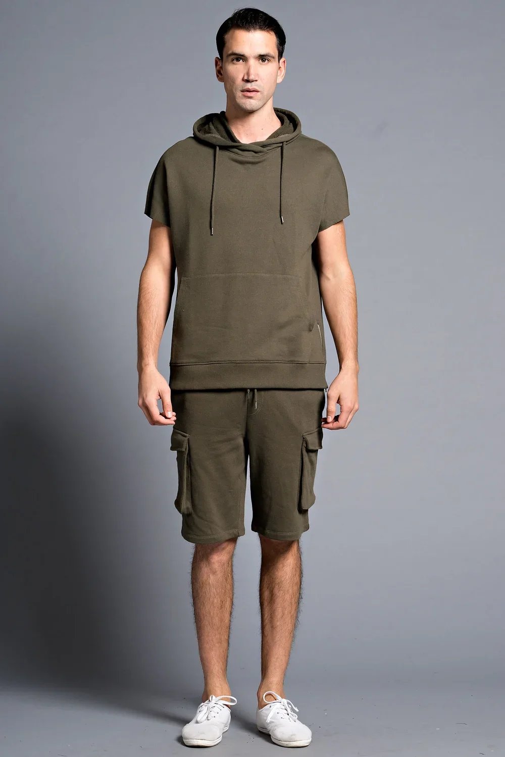 Man wearing an olive green hooded t-shirt with matching cargo shorts — Urban Nation men's sets